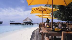 On the beach, white sand, free beach cabanas, sun loungers