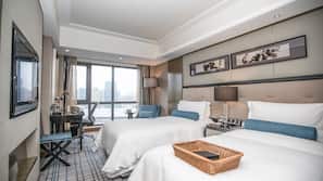 Ropa de cama de alta calidad, edredones de plumas, minibar y caja fuerte