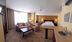 Parlor Suite | Down comforters, in-room safe, desk, laptop workspace