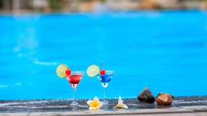 Outdoor pool, pool umbrellas, sun loungers