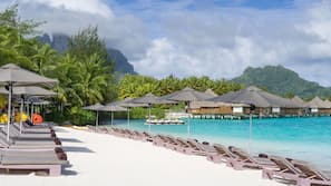 Private beach, white sand, sun-loungers, beach umbrellas