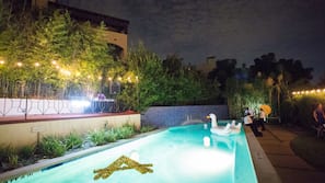 Seasonal outdoor pool, open 10 AM to 10 PM, pool loungers