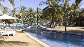Outdoor pool, open 7 AM to 7 PM, pool umbrellas, sun loungers