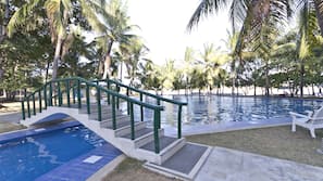 Outdoor pool, open 7 AM to 7 PM, pool umbrellas, sun loungers