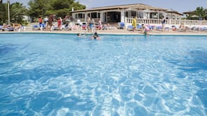 Outdoor pool, pool umbrellas, pool loungers