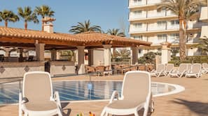 Indoor pool, outdoor pool, pool umbrellas, pool loungers