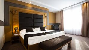 Literie hypoallergénique, minibar, coffre-forts dans les chambres