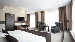 Literie hypoallergénique, minibar, coffre-forts dans les chambres