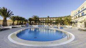 Outdoor pool, pool umbrellas, pool loungers