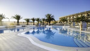 Outdoor pool, pool umbrellas, pool loungers