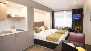 Desk, blackout curtains, soundproofing, iron/ironing board