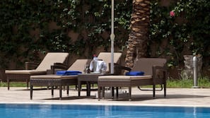 Indoor pool, seasonal outdoor pool, pool umbrellas, sun loungers