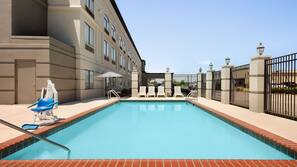 Outdoor pool, open 7:00 AM to 10:30 PM, sun loungers