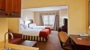 Premium bedding, desk, laptop workspace, blackout drapes