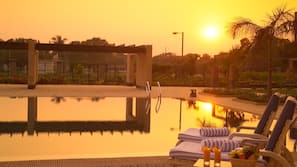 Outdoor pool, pool umbrellas, pool loungers