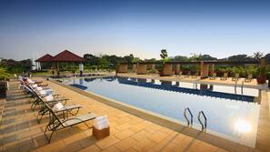 Outdoor pool, pool umbrellas, pool loungers