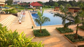 Outdoor pool, pool umbrellas, pool loungers