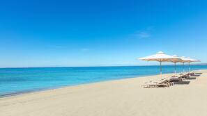 Private beach, sun-loungers, beach umbrellas, beach towels