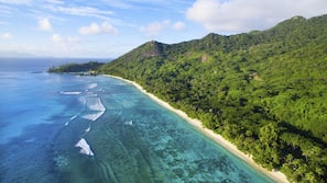 White sand, beach towels, sailing, kayaking