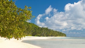 White sand, beach towels, sailing, kayaking