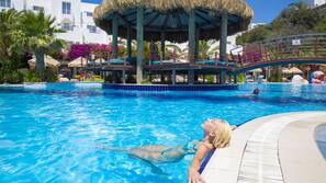 Indoor pool, outdoor pool, pool umbrellas, pool loungers