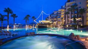 2 outdoor pools, pool umbrellas, sun loungers