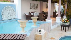 Outdoor pool, open 8:00 AM to 7:30 PM, pool umbrellas, pool loungers