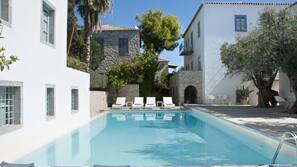 Outdoor pool, pool umbrellas, pool loungers