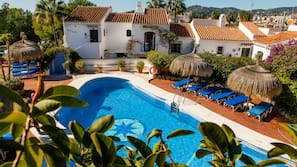 Seasonal outdoor pool, pool umbrellas, sun loungers