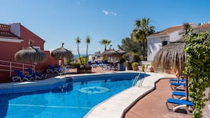 Seasonal outdoor pool, pool umbrellas, sun loungers