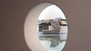 Outdoor pool, pool umbrellas, pool loungers