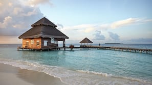 Private beach, white sand, beach towels, scuba diving