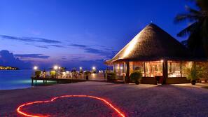 Private beach, white sand, sun loungers, beach umbrellas