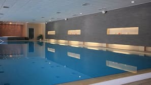 Indoor pool, seasonal outdoor pool, pool umbrellas, pool loungers