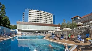 Indoor pool, seasonal outdoor pool, pool umbrellas, pool loungers