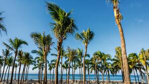 On the beach, sun loungers, beach towels, beach massages