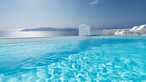 Outdoor pool, pool umbrellas, pool loungers