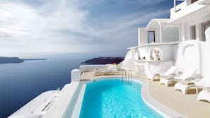 Outdoor pool, pool umbrellas, pool loungers