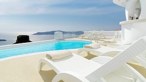 Outdoor pool, pool umbrellas, pool loungers