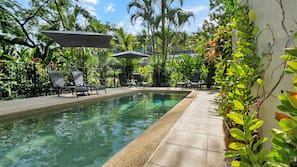 Outdoor pool, pool umbrellas, pool loungers