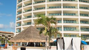 On the beach, sun loungers, beach umbrellas, beach towels