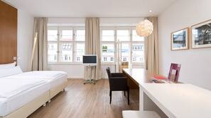 Literie hypoallergénique, minibar, coffre-forts dans les chambres