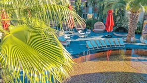 Outdoor pool, pool umbrellas, pool loungers
