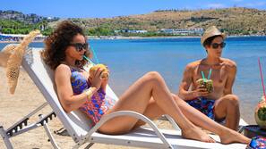 On the beach, free beach cabanas, sun-loungers, beach umbrellas
