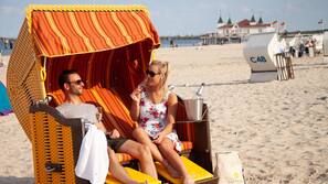 On the beach, white sand, beach towels