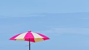 On the beach, beach umbrellas, beach towels