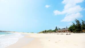 Private beach, white sand, sun-loungers, beach umbrellas
