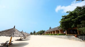 Private beach, white sand, sun-loungers, beach umbrellas
