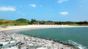Private beach, white sand, sun-loungers, beach umbrellas