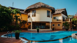 Outdoor pool, pool umbrellas, pool loungers